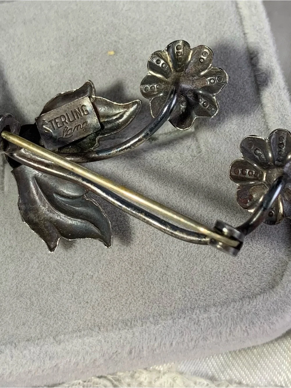 Vintage Sterling Silver Floral Brooch with Red Rhinestone Centers.Lang Sterling